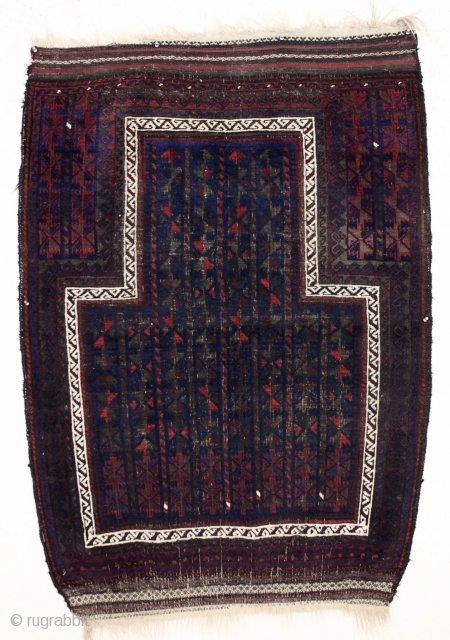 antique baluch prayer rug with a serious and muscular mihrab. All natural colors. Overall good condition with even low pile and heavy brown oxidation. Original selvages and fancy kelim ends. Ca. 1880-90.  ...