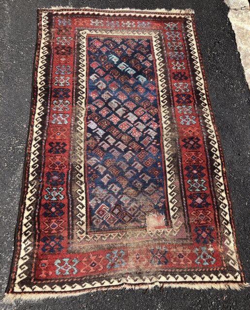 Antique Turkish knotted Baluch rug with an uncommon design and an unusual range of vibrant colors. Lovely multiple reds, light blues and greens. Mostly decent pile but one end has significant heavy  ...