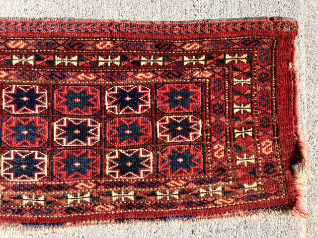 Antique turkman ersari pile weaving, probably a trapping. Unusual all over star design. Good pile. All natural colors with multiple reds and strong yellow highlights. Reasonably clean. Attractive weaving. 19th c. 15”  ...