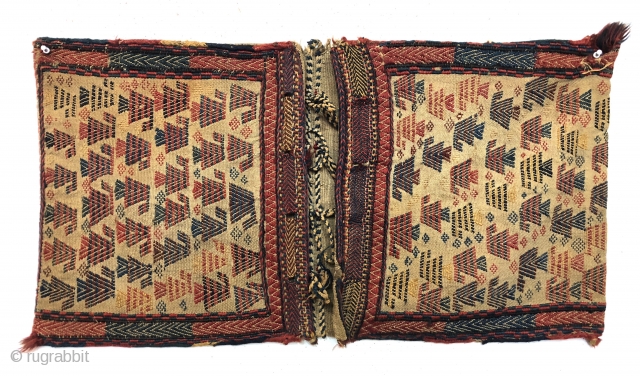 Antique pair of complete south Persian flat woven mixed technique bags. Interesting and elegant field design. This original pair is in remarkably untouched condition with nice supple handle. All good natural colors.  ...