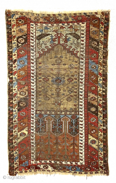 Antique Anatolian prayer rug, ladik or a village variant, in rough but intact condition. All natural colors. Characteristic ladik field with an atypical border. Overall very low pile with foundation showing. Remnant  ...