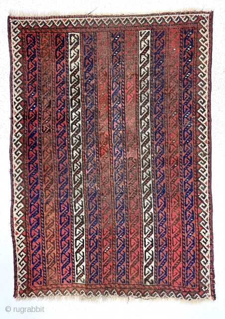 Antique Baluch rug with an interesting striped or cane design. I’ve had a number of striped Baluch rugs but none with this particular design. All good natural colors featuring several reds. Good  ...