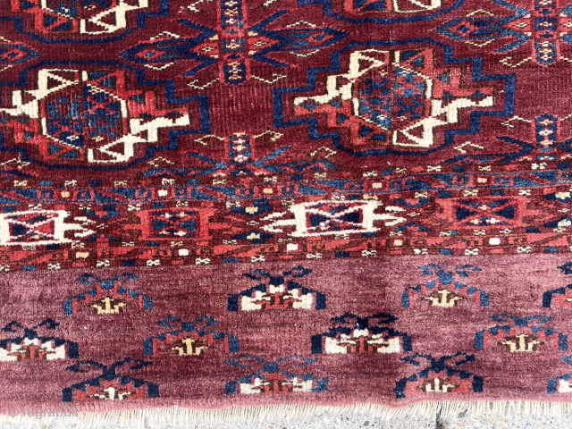 Antique turkman Chuval, possibly Kizil, with classic field and an unusual attractive skirt. Overall excellent conditions with mostly good thick pile. Reasonably clean with saturated natural colors. Multiple reds and deep yellow  ...
