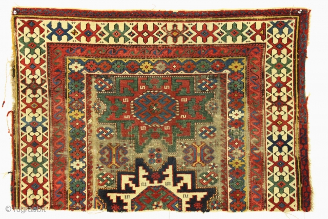 Antique little caucasian rug fragment. Very fine quality and weave. Vibrant natural colors. Corroded ground. Clean but rough as shown. Good age, ca 1880 or earlier. 2'2" x 3'1"    