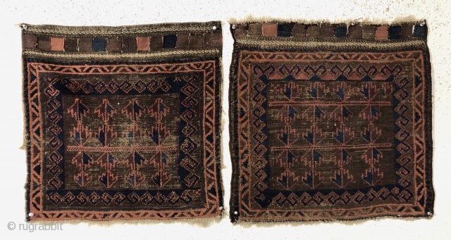 Antique original pair of Baluch bagfaces. Interesting and unusual horizontal use of Baluch tree motifs. Overall low pile with scattered heavy brown oxidation. Remnant rough selvages, rewrapped on one bagface. Original closure  ...