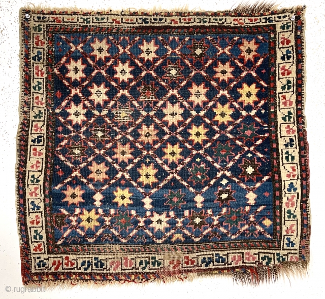 Antique large bagface, probably northwest Persian Kurdish, with an unusual star filled lattice. I like the “clover” border. Overall fair condition with some wear and oxidized blacks. All natural colors. As found,  ...