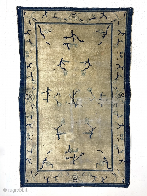 Old Chinese rug with an unusual and spacious field and border design. I have never had or seen this interesting design. No idea of the possible symbolism or is this just an  ...