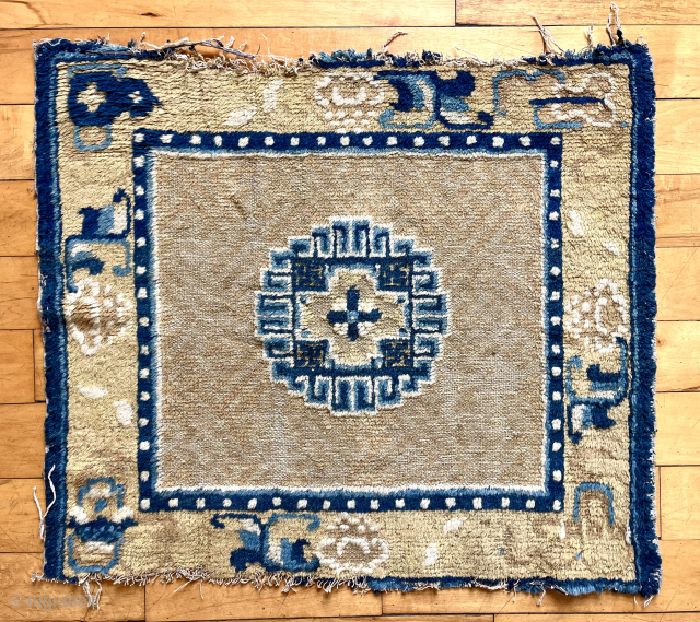 Early Chinese square. Soft wool and floppy old handle. Low pile and some oxidation. Ends unraveling. Ex R. Newman. Reasonably clean. Ca. 1800  24” x 27”      