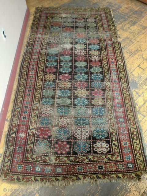 Antique rug. Unusual design. Northwest Persian? Caucasian? Mystery? Restorable. With wear and edge roughness as shown. Priced accordingly. Late 19th c. 4'3" x 8'6"         