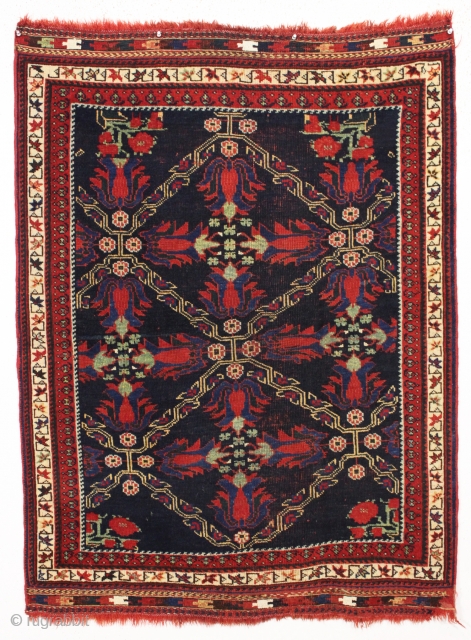 antique small afshar rug with attractive tulip design field. Nice example with all wool foundation. Overall pretty good condition with good even low pile, original selvages and fancy end finishes. All natural  ...