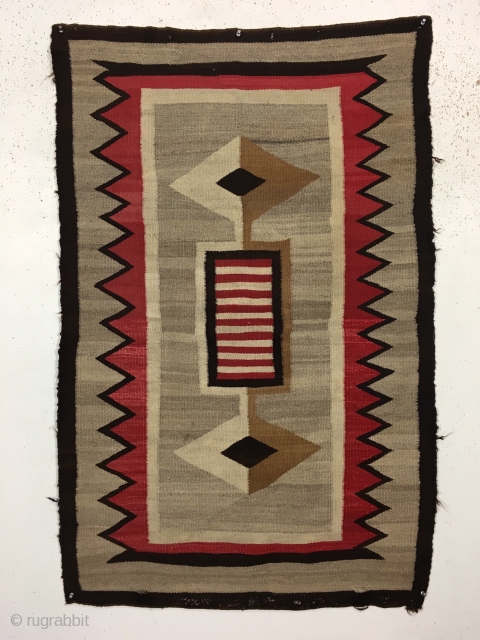 Antique small Navajo rug with a very eye catching design. Fresh New England find. Beautiful colors and soft blanket like handle. In reasonably good condition with some slight selvage roughness and a  ...