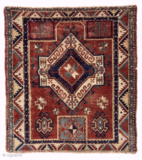 Antique fachralo Kazak prayer rug. Early example with spacious drawing and natural colors. Intact with some decent pile but mostly very low pile, numerous scattered wear spots and a few old little  ...