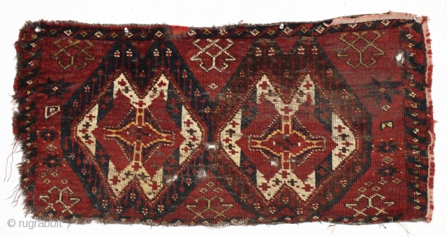 antique ersari trapping or torba. Charming, naive and sophisticated at the same time. Also quite damaged. Still an object with life. Good colors. ca. 1870 or earlier. 20" x 41"    ...