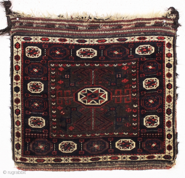 antique complete baluch square middle bag. Beautiful all natural colors. Mostly good pile. Oxidized browns. Fancy end finish. Remnant original goat hair wrapping. Recent good wash. Good age, ca. 1875. 2'6" x  ...