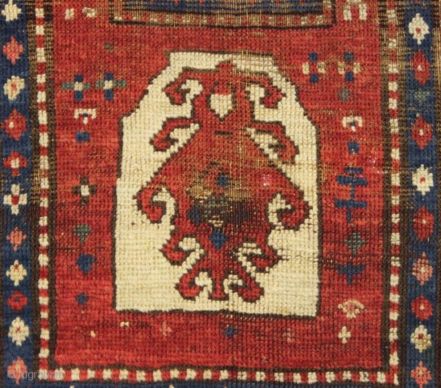 One of the most archaic and powerful little kazak or Karrabaugh prayer rug I have had. Right up there in rough condition as well. Very coarse weave. All good colors. Recently washed.  ...