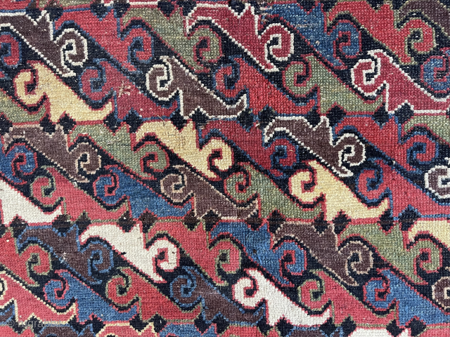 Antique northwest Persian or Kurdish corridor carpet. Eye catching field filled with colorful zoomorphic or botanical motifs ( you decide ). Lovely camel border. Mostly decent low pile with a small field  ...