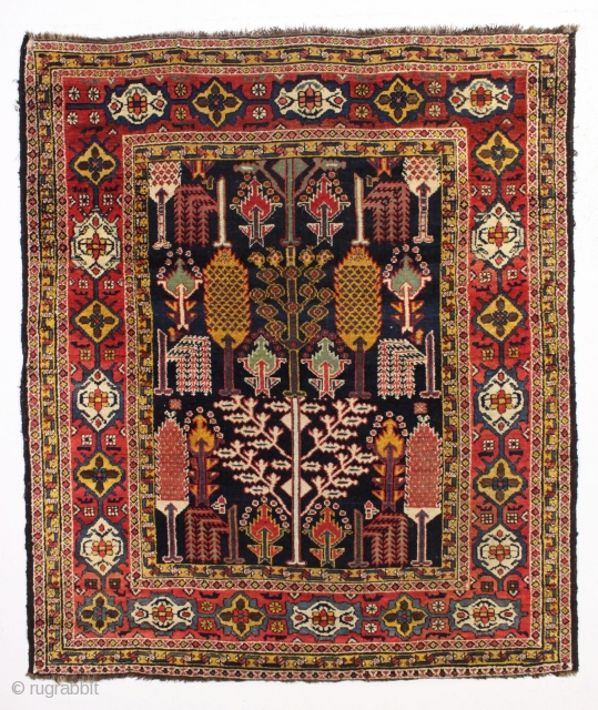 Beautiful antique tribal rug, probably Baktiari, with a great design and superb colors. Mostly thick full pile and terrific nearly square size. Lovely greens, purples and a clear yellow/gold. Wool warps. Clean,  ...