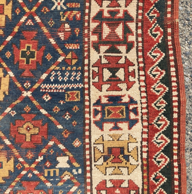 Antique small kazak rug with an uncommon all over design. Freely drawn with a fun candy cane lattice. As found, very very dirty but i can see under the grime the colors  ...