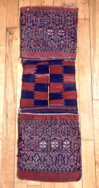 Interesting original pair of flat woven bags. Appears to be kelim weave with powerful small scale figure ground designs. Possibly Anatolian yuncu? Overall pretty good condition including backs and attractive bridge. I  ...