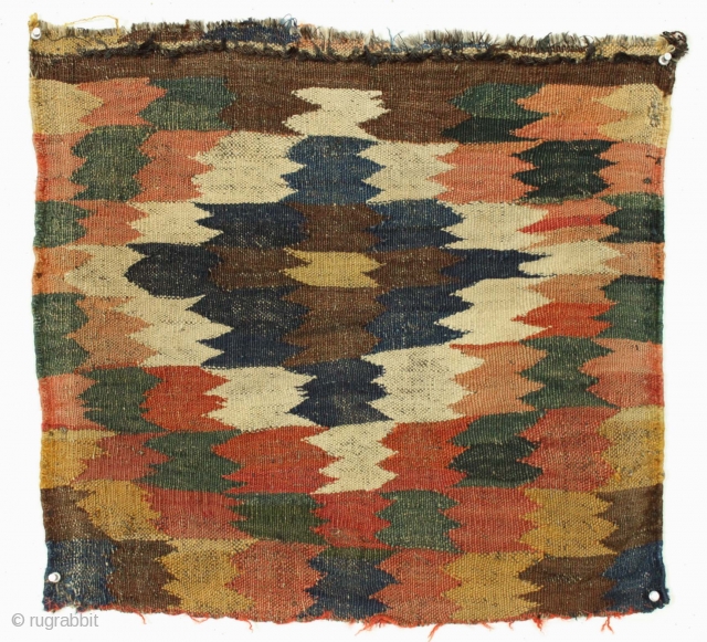 Colorful and unusual old flatweave fragment. All good natural colors including a fine green and 2 yellows. All wool with goat hair warps. Origin? Age? Charming? 21" x 23"    