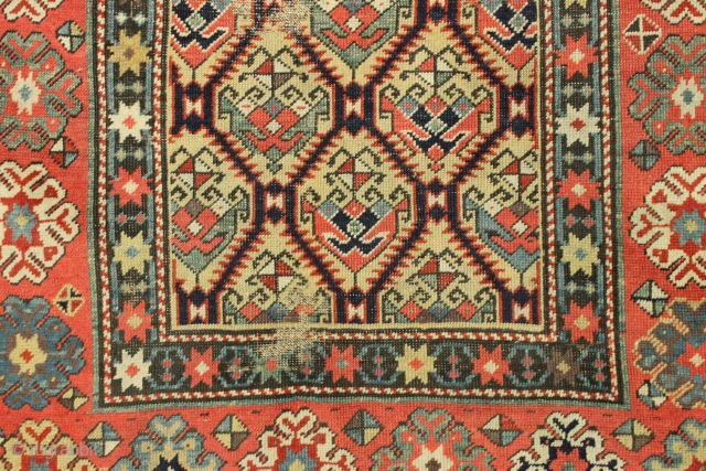 Early caucasian rug fragment. Beautiful drawing and world class color. All natural colors featuring a terrific yellow ground, real purples, rich greens and 2 reds. Thin with mostly good even low pile  ...