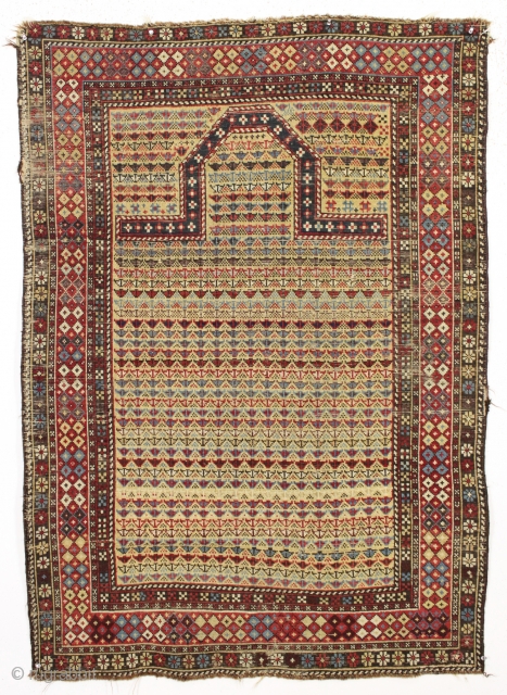 Antique yellow ground caucasian prayer rug with an unusual design. Fresh New England find. Good even low pile and all natural colors. As found, untouched for many years. dirty and ready for  ...