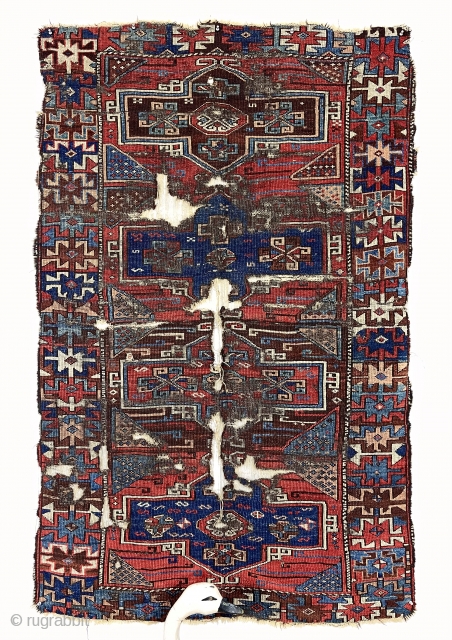 Antique east Anatolian Kurdish rug with interesting design and good natural colors but very rough condition. Particularly eye catching very colorful border. Edge loss, creases,wear and numerous good holes. Priced accordingly. Pay  ...