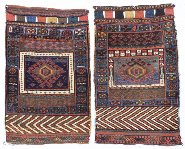 Antique original pair of interesting bagfaces, probably northwest Persian Kurdish. Unusual fields and eye catching skirt panels. Overall good even low pile. All saturated natural colors. Reasonably clean. Original closure tabs. Interesting  ...