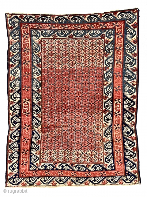 Antique Caucasian kuba or seichour rug. Unusual field design and iconic “running dog” borders. Overall good condition for the age with mostly even low pile. I see what looks like a small  ...