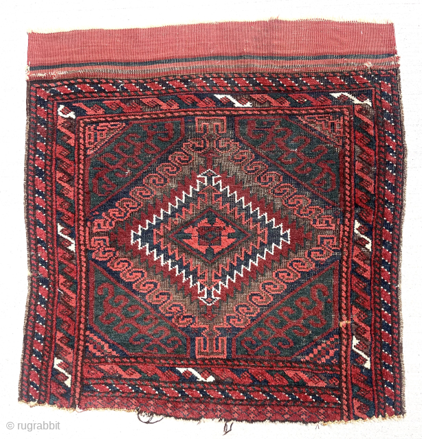 Older Baluch bagface. Classic latch hooked “mushwani” type. As good color as I have seen with rich reds and greens.  Lovely sculpted brown oxidation. From my modest collection. 19th c. 25”  ...