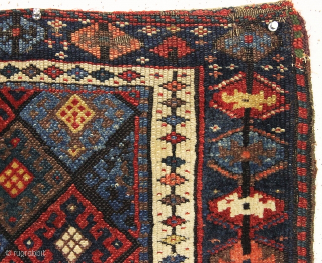 antique complete connected pair of kurdish bags with an unusual ashik gul border. Mostly good pile with a few spots of wear and edge roughnes. All natural colors featuring a nice aubergine,  ...