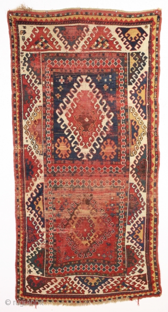 antique bordjalou kazak rug. Interesting fresh older example. Dramatic bold main border and unusual compartment field. All natural colors. As found, very dirty with wear, brown oxidation and some damage as shown.  ...