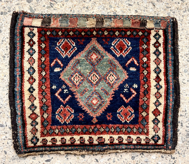 Antique little Persian bag face with lovely colors including an eye catching green central medallion. Nice thick pile. Fine thin wefting. Veramin? Clean. As nice as it gets. One of my personal  ...