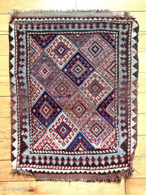 Interesting older little mystery pile weaving. Looks to be Kurdish by design but weave unlike typical diamond bag. Not offset knotted. Ends have original remnant flat weave kelim with no indication of  ...