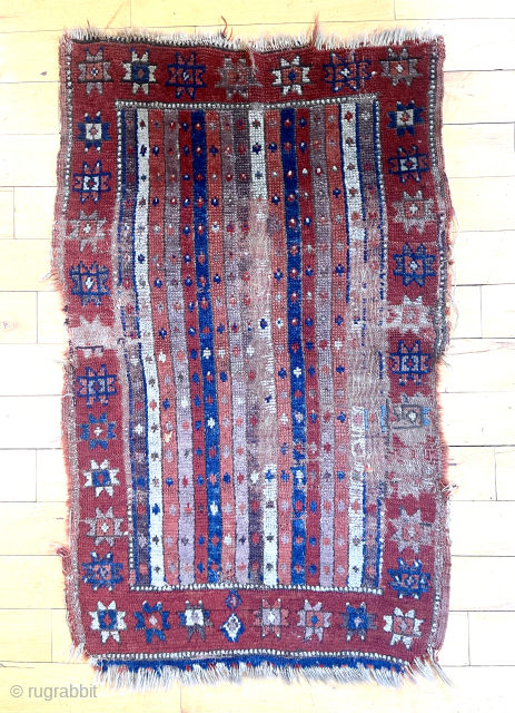 Early Turkish yastik. Classic striped field with a rainbow of natural colors. Some wear areas and unraveling. Has good presence. Reasonably clean. Shop cleaning.
19th c.
24” x 39”
waynecbarron@aol.com