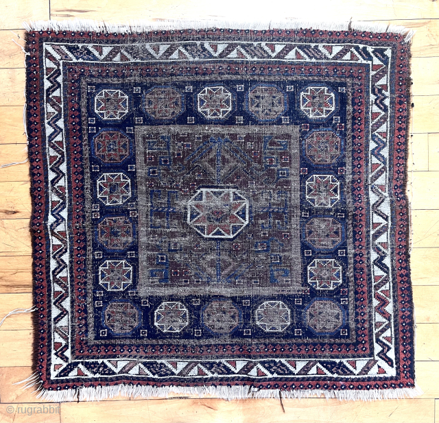 Ghostly Baluch square middle Bagface. Must like octagons. Great scale. Worn and abused but more or less all there. Good age.
32” x 34”
waynecbarron@aol.com