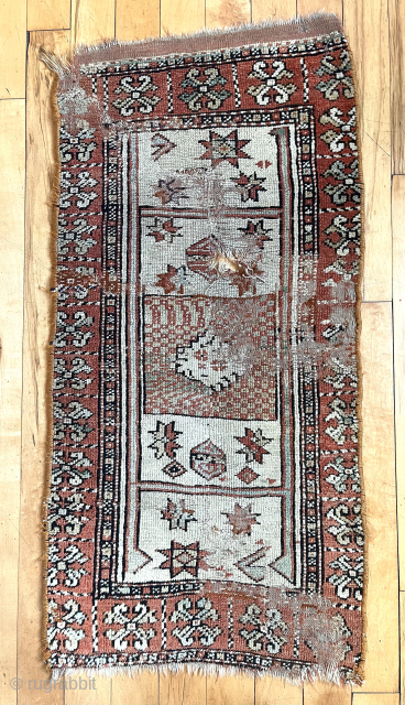 Antique something. Manastir? Yastik? A singular little weaving. Some original end flat weave. Holes, wear, edge loss. Still I always liked it. 19th c.
22”x 46”
waynecbarron@aol.com