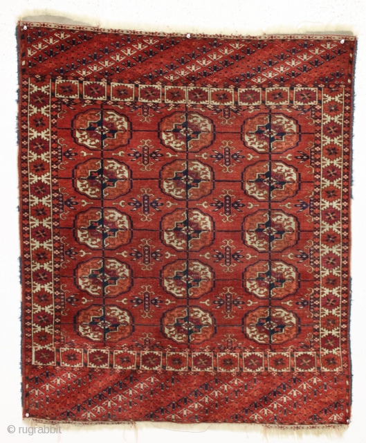 antique little tekke rug in good condition with all natural colors and interesting skirt panels. Even pile with slight center wear as shown. "as found", no repairs and could use a good  ...