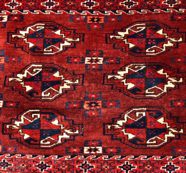 Antique yomud chuval with rich saturated natural colors, good pile and relatively spacious drawing. The elegant star minors use a very nice light blue. Overall very good condition for the age other  ...