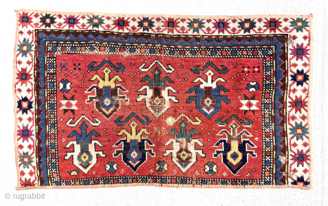 Old little pile fragment. A Bagface? Or the remains of a larger weaving. Design and color (cochineal) point to karrabagh. Whatever it is I like it very much. Playful coloring. 19th c.  ...