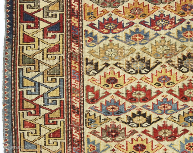 antique ivory ground east caucasian rug with a charming and very unusual design. Probably shirvan. "as found", quite dirty, with scattered wear as shown and some minor edge loss all around. Although  ...