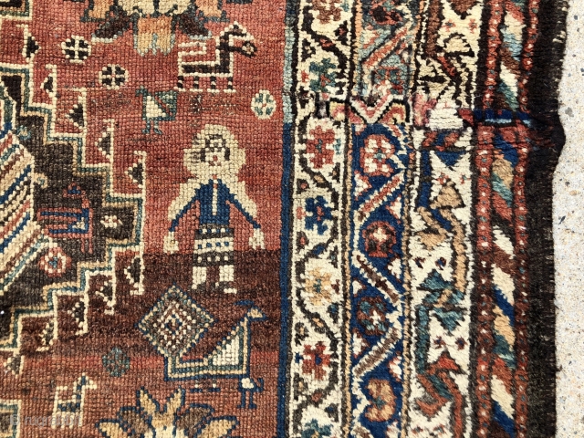 Antique Persian tribal rug with attractive drawing featuring good sized people in fancy dress and charming fan tailed peacocks. Possibly Luri? Overall even low pile with some scattered wear as shown. Interesting  ...