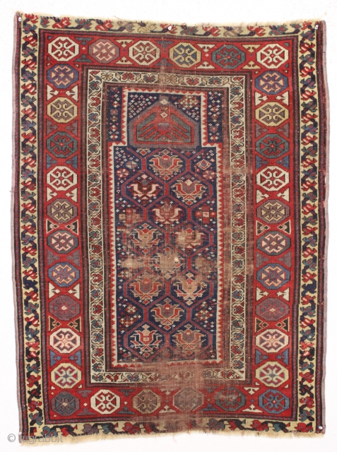 early caucasian prayer rug with an unusual and beautiful design. All natural colors featuring a fine old purple. As found, very very dirty, thin, with wear as shown. Could be restored or  ...