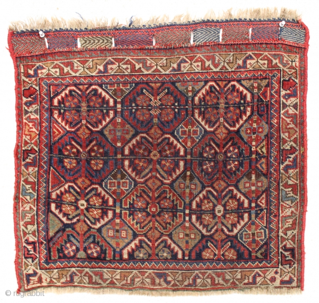 antique south Persian Baseri bagface with iconic design, good colors and fine fine weave. All very nice natural colors with pretty greens and light blues. Even low pile. Original closure tabs. Rewrapped  ...