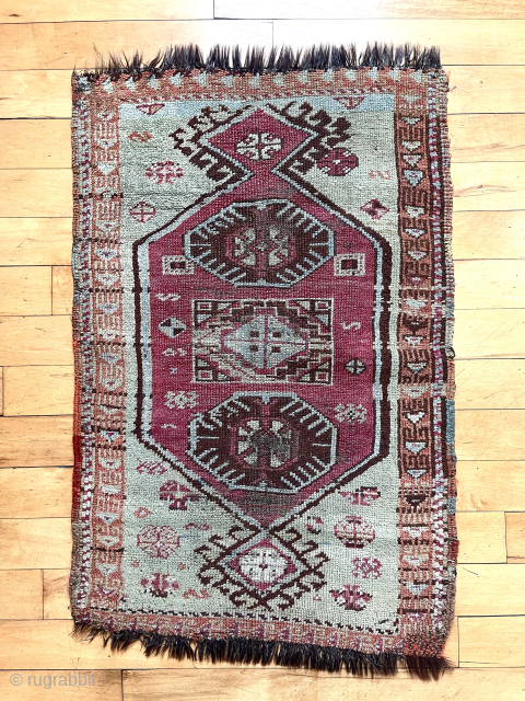 Antique east Anatolian ysstik. Somewhat larger than typical with an attractive blue green ground. Mostly decent pile with some spots of heavy wear. Characteristic east Anatolian natural colors. Appears to have goat  ...