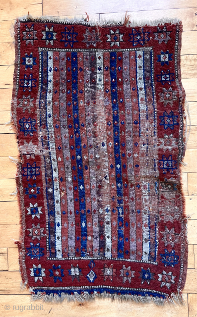 Antique Turkish yastik in less than perfect condition. Attractive stripe design with an unusual older color palette. Deep madder purples and reds but not the expected cochineal. Reasonably clean. 19th c. 24”  ...