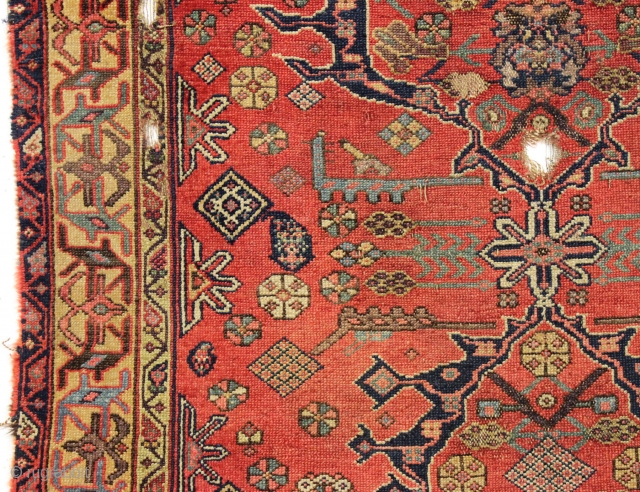 Antique interesting persian village rug. Very dynamic drawing and first rate colors. Mostly fair pile but with damage as shown. "as found" and in need of a good wash. Ca. 1875, probably  ...