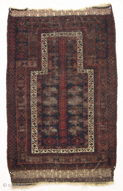 Early little timuri baluch prayer rug. Interesting archaic tree motif. All natural colors. "As found", dirty and thin with heavy black oxidation. Remnant original fancy selvages and kelim ends. 3rd qtr. 19th  ...