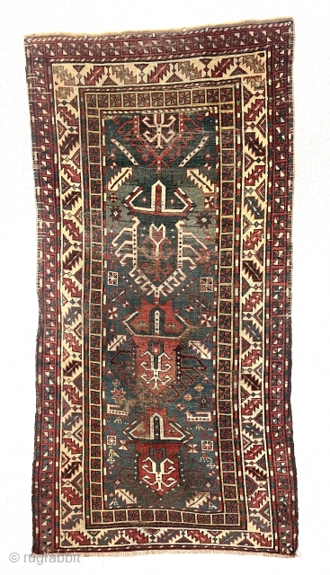Antique unusual Caucasian long rug with some interesting features that evoke a talish origin. Large palmettes I associate with northwest Persian rugs but minor borders with talish type squares and selvages that  ...