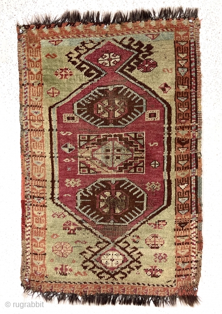 Antique little east Anatolian Kurdish yastik with goat hair warps and pretty green ground. Classic medallion design field. Fair condition, some wear to foundation. As found, dirty, in need of a good  ...